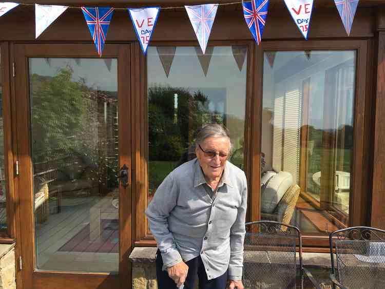 Owen stands for the two minute silence to honour the war dead (May 8)