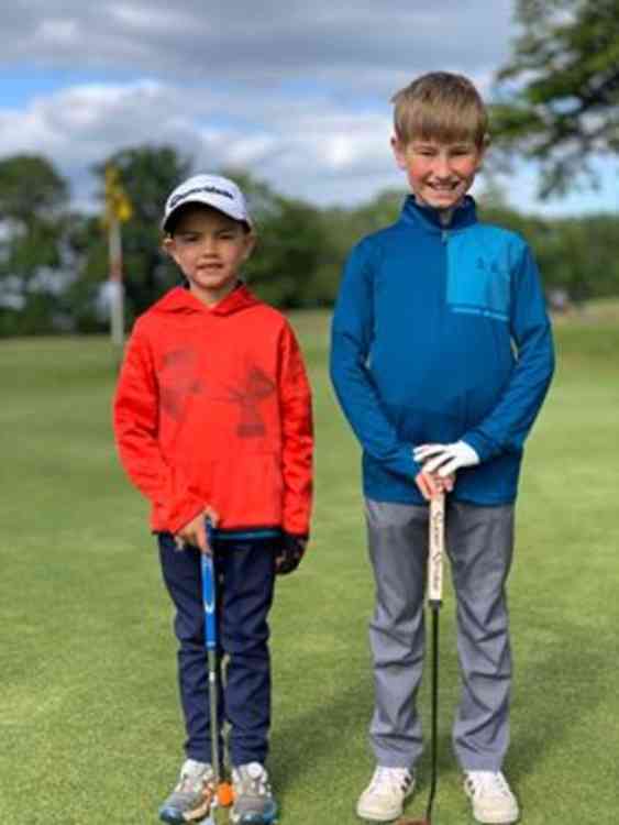 Owen (right)  and Ollie (left) are thrilled to be back golfing