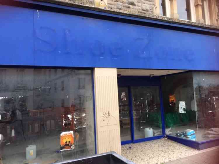 Workmen were inside the former Shoe Zone shop