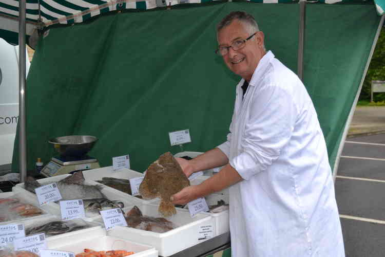 The local fishmonger has been serving at the markets since the 1970s