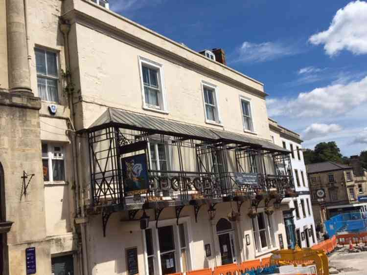 The pub and hotel are a landmark in the town