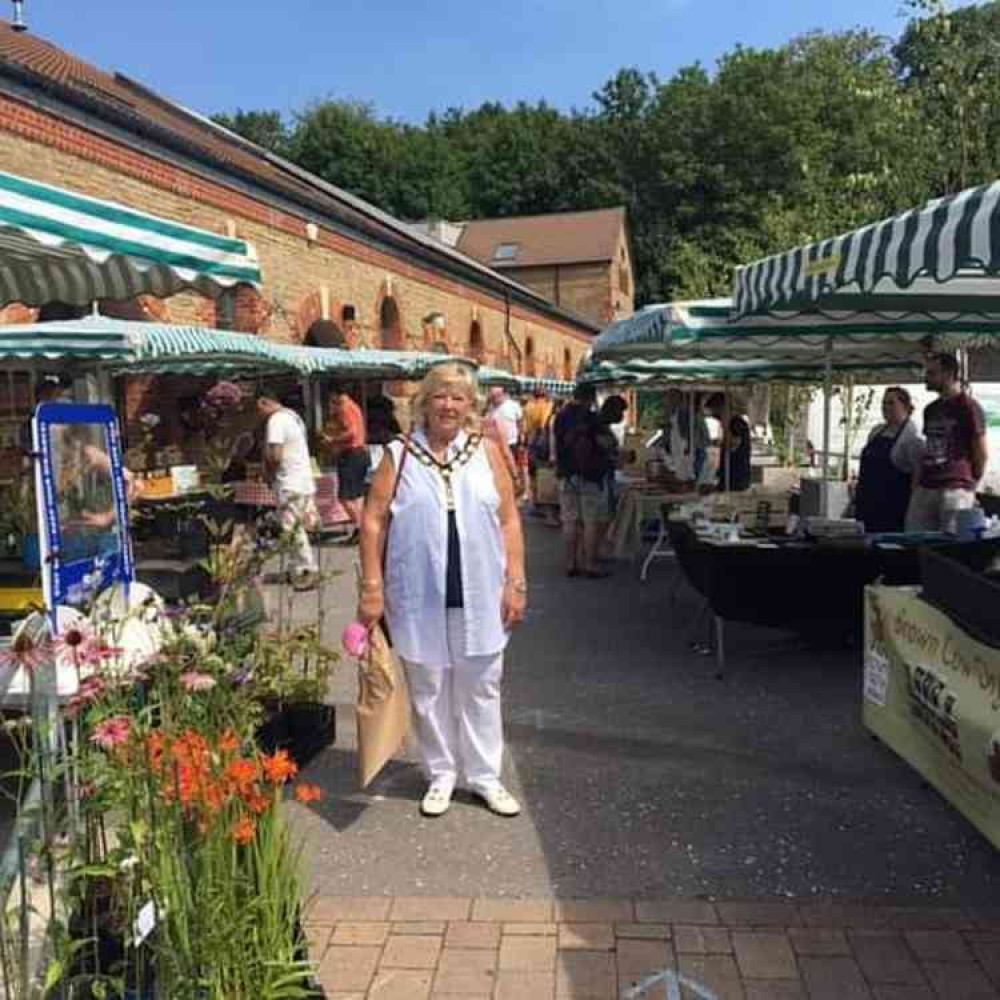 Frome's Mayor Anita Collier shopping at last month's Somerset Farmers Market at the Cheese & Grain patio