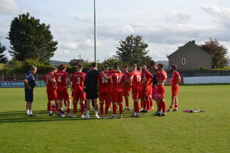 The post match huddle. Manager Danny Greaves was clearly pleased with his side