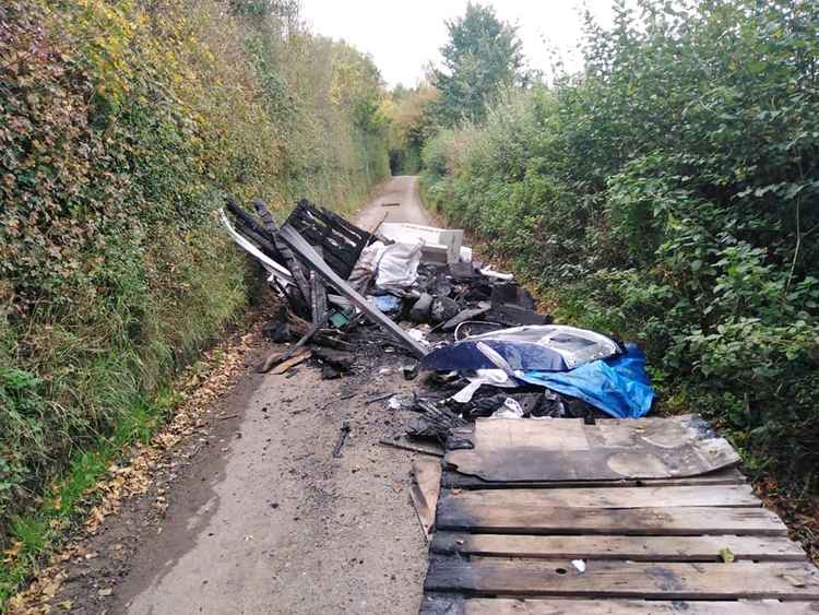 This the second time a huge fly tip has closed off a road in the town