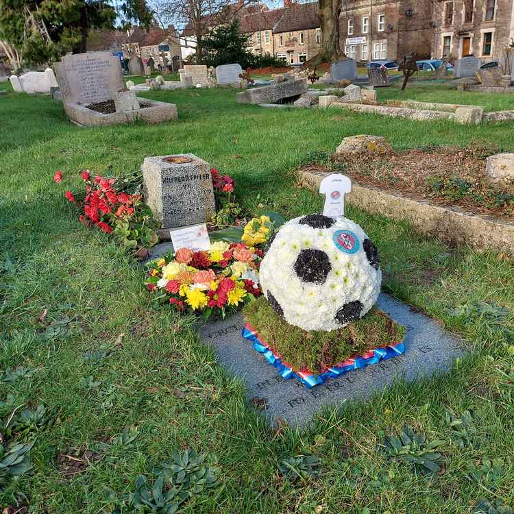 John Fuller's grave with a floral tribute to his sporting love November 22