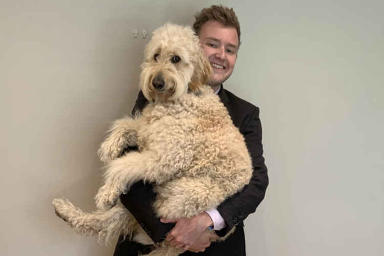 Trainee solicitor at Thatcher + Hallam, James with his lunchtime companion