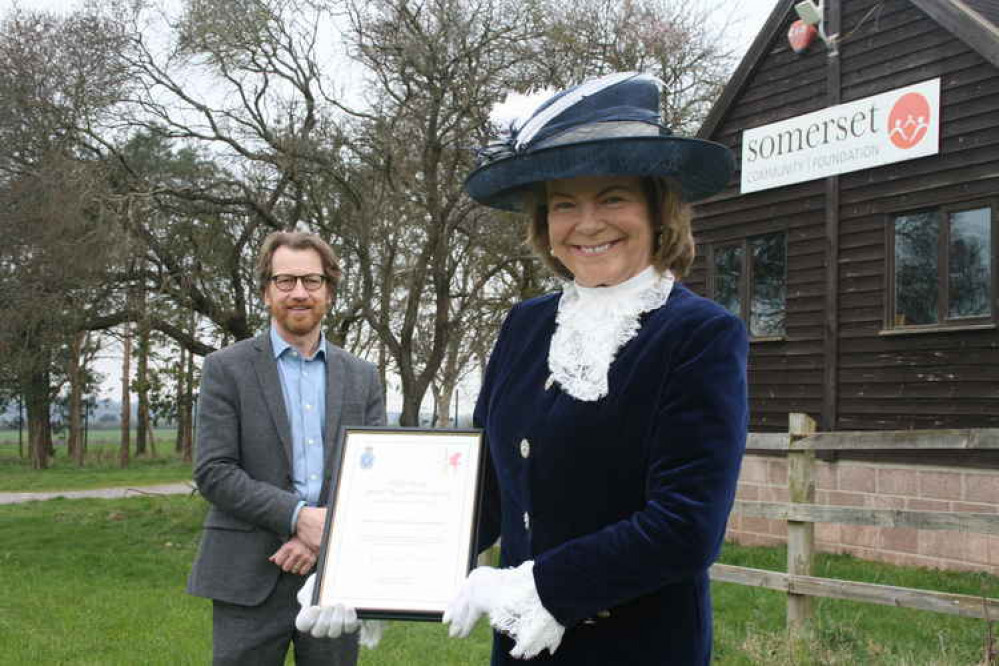 Justin Sargent, Chief Executive at Somerset Community Foundation (SCF) accepts a High Sheriff's Special Recognition Award from The High Sheriff of Somerset, Mary-Clare Rodwell.