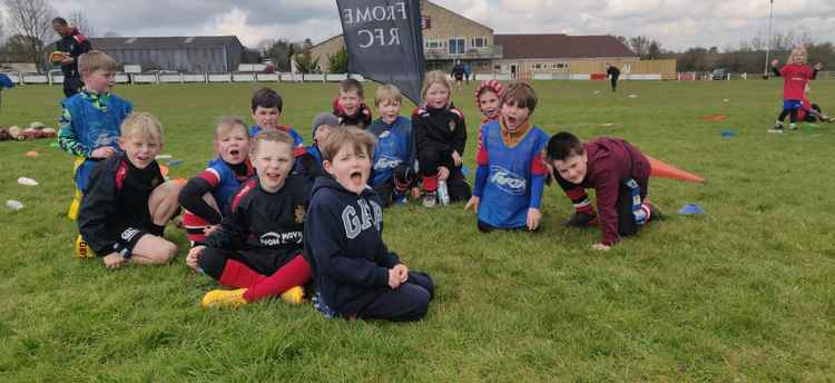 Smiles all around from the littlest players at Frome RFC