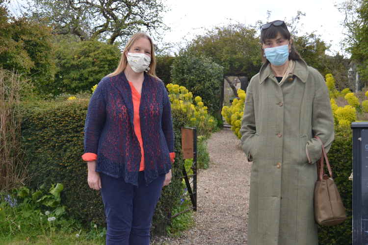 Sam Evans (left) greets Baroness Barren the Minister for Civil Society at the Mells Walled Garden May 7