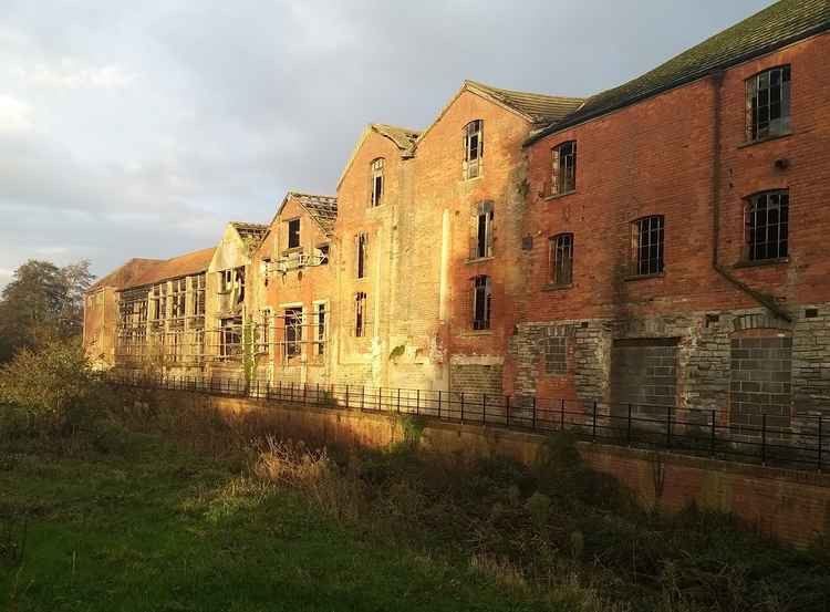 aily's Buildings bathed in sunlight: New hope for Glastonbury and its many plans for investment and future prosperity