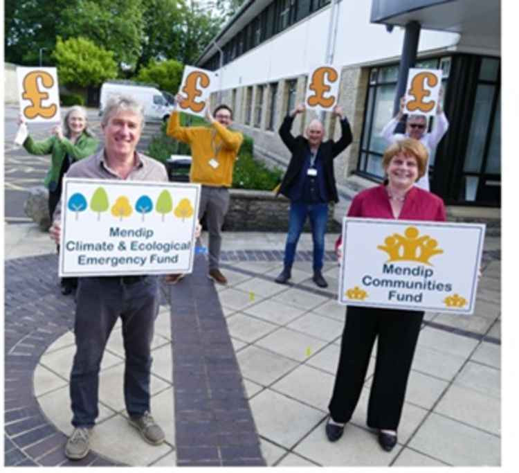 Two new funds launched : Councillors urge Mendip residents to apply for cash help to get their community projects and eco ideas up and running.  (Front left: Cllr Tom Ronan, Front Right: Cllr Ros Wyke, Leader of Mendip District Council)