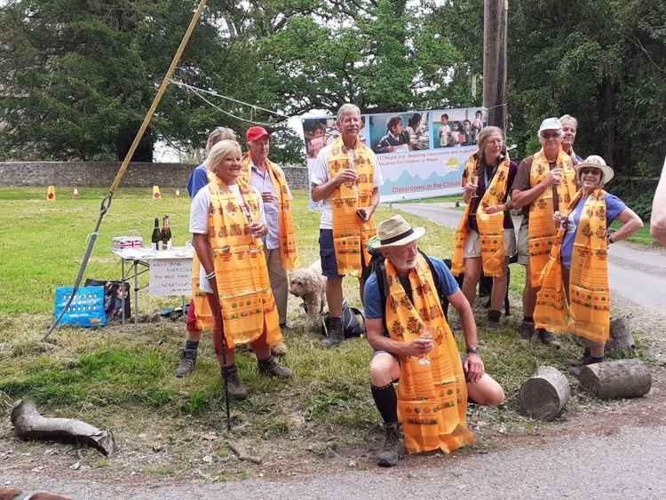 The final stretch saw walkers receiving Nepalese prayer shawls