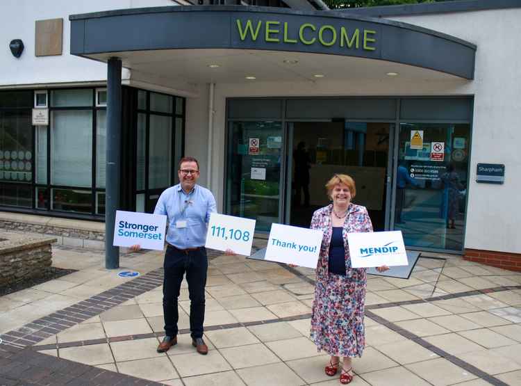 (L to R)  Thank you Mendip: Deputy Leader of Mendip District Council and Portfolio Holder for Enterprise and Finance, Cllr Barry O'Leary, and Leader of Mendip District Council, Cllr Ros Wyke, photographed outside the Mendip offices in Shepton Mallet as