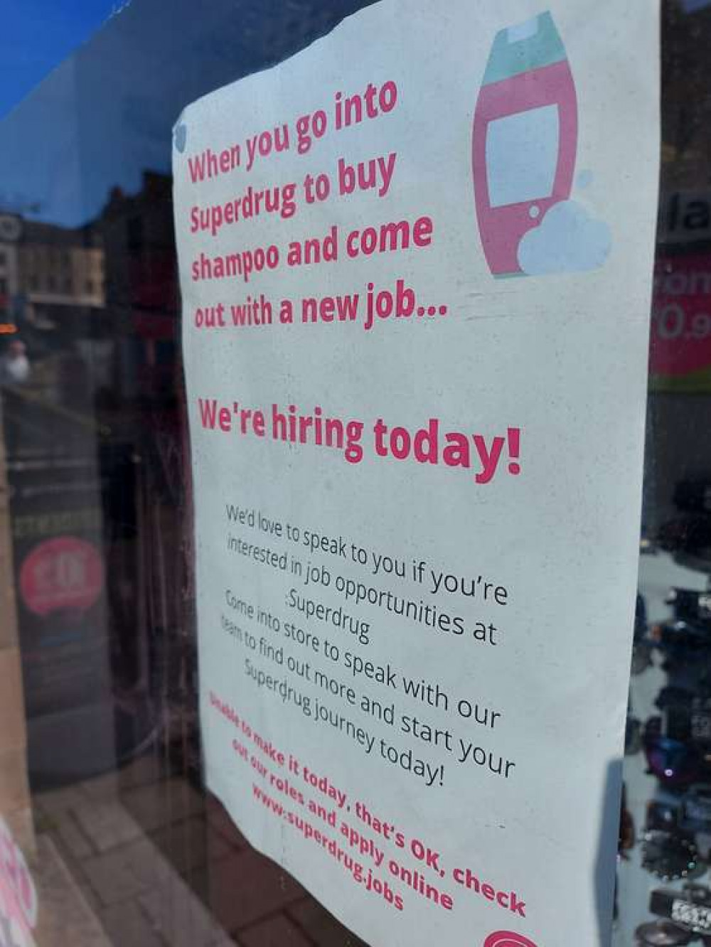 The sign in the window of the shop on Bath Street