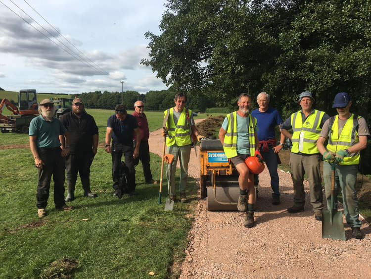 Volunteers and contractors after the first phase of the path extension