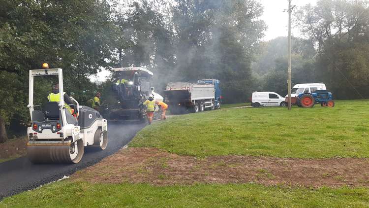 The asphalt laying in progress