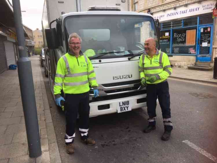 Two very jolly recycling collectors were out and about today (April 13)