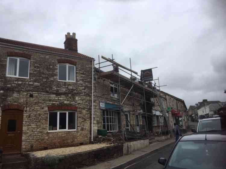 Roofers were busy at work today June 30