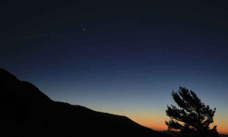 December 13 - Look closely towards the top of the picture: Saturn is above Jupiter as they move closer together (NASA)