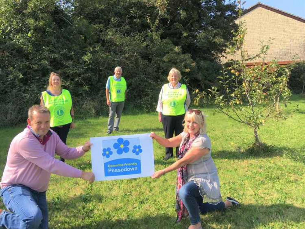 Lions Sarah Oughton, Margaret Burdon and Colin Marsh (pictured in tabbards) met with Gavin Heathcote and Cllr Karen Walker last week, Directors of Peasedown Community Trust, to congratulate them on the grant towards Dementia Friendly Peasedown.