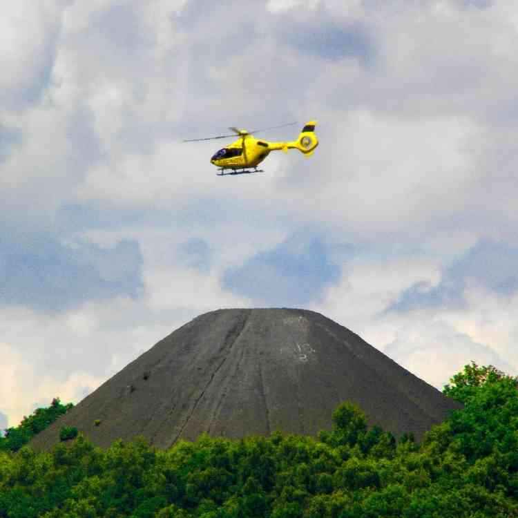 Back in June the local utility company was captured buzzing over the volcano in this stunning shot