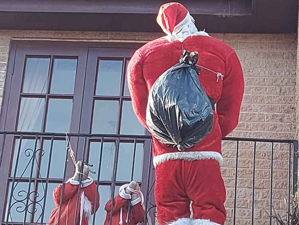 A slightly macabre Santa over in Frome : He won't be able to recycle that sack