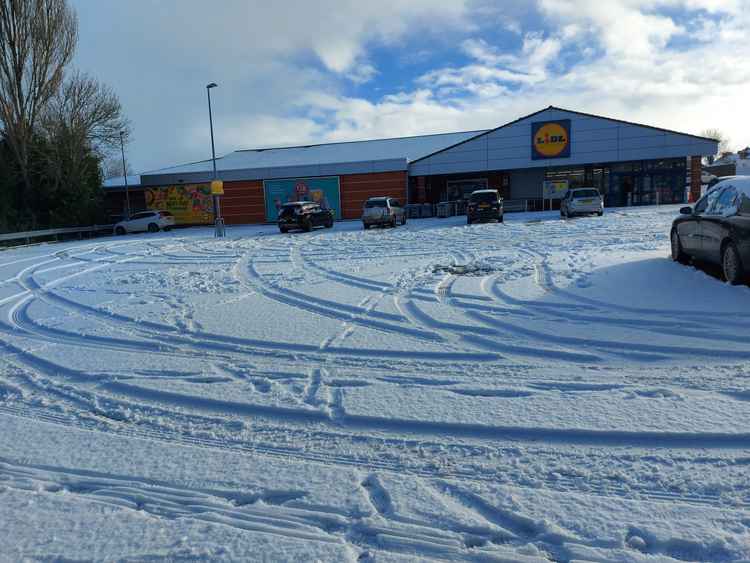 The Frome Lidl staff were also faced with snow clearing duties on January 24