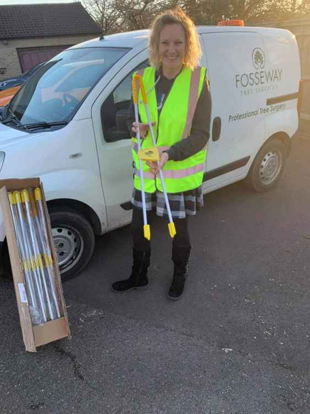 Laura Jardine with the donated litter grabbers