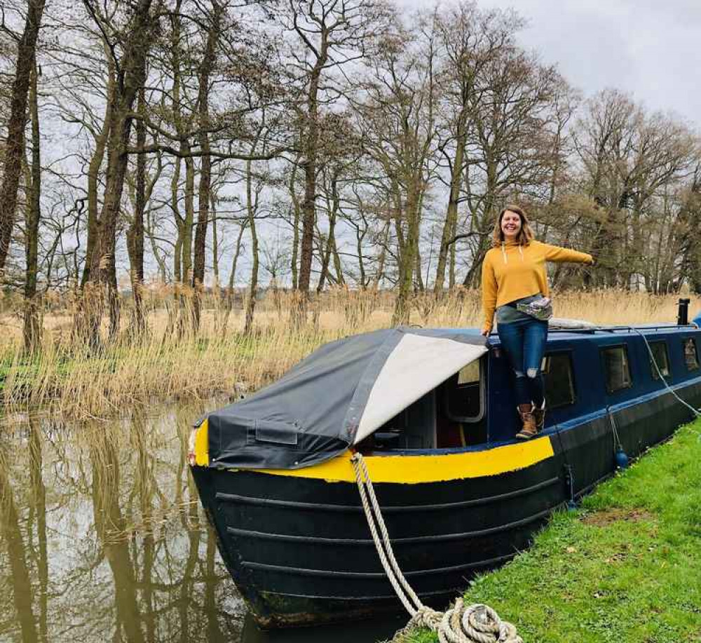 Avril McGovern with her boat. Avril McGovern. Permission for use by all partners.