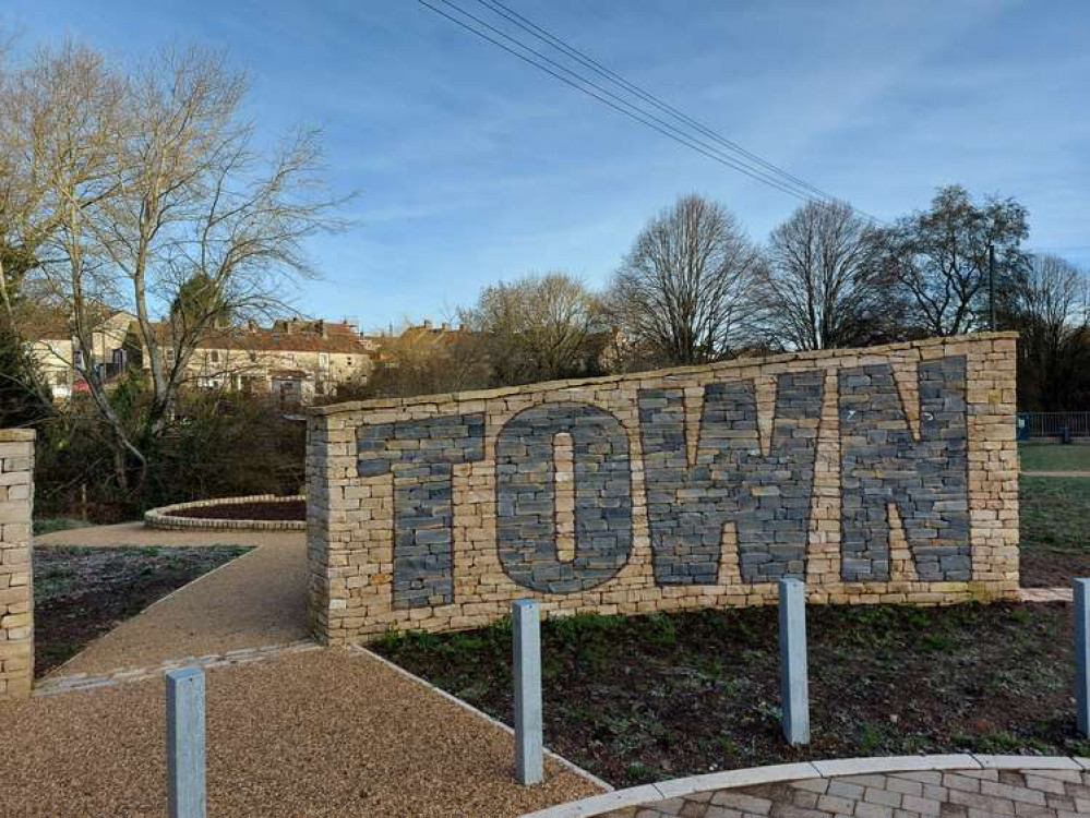 The Midsomer Norton Town Park sign in the summer