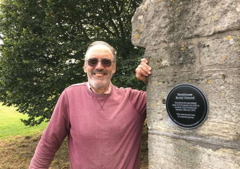 Local historian John Payne, next to the newly installed plaque at the Bath Union Workhouse Burial Ground