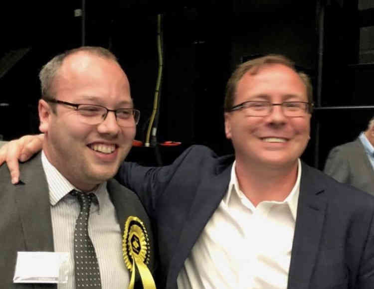 Allen Mayes celebrates his win last May with Independent Group leader Luke Spillman.