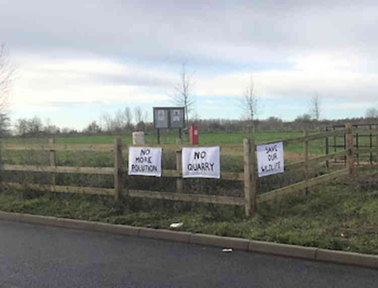 With problems registering a digital protest, campaigners have taken to more old-fashioned methods, like placing banners on the roadside and close to fields that will eventually be devoured by excavations.