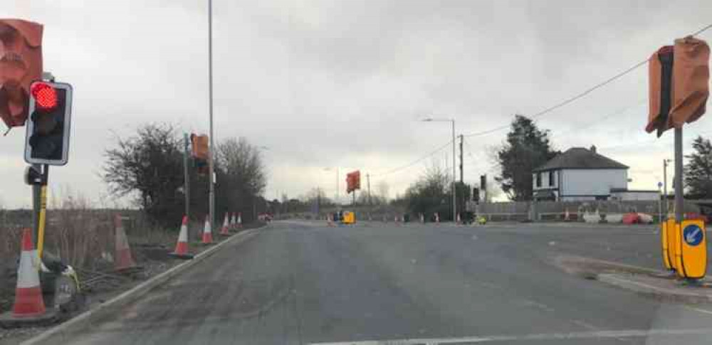 The junction this afternoon. New 'temporary lights have been put in place but it seems no date is yet in sight for the permanent lights to be made active.