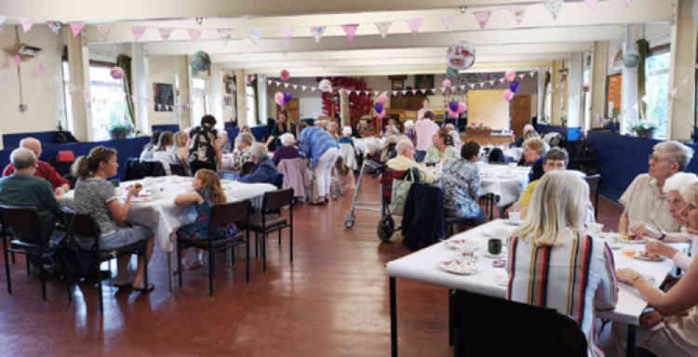 Caring and sharing: Residents and carers at last year's Extracaring summer party. The clock is ticking on whether the event can be repeated this summer but hopes remain - and there will, of course, always be the Christmas party!