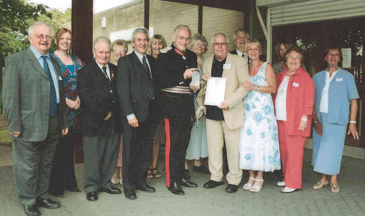 Tilbury heroes in 2007:  From left with Lord Petre and Peter Hewitt - Trevor Martin, Lorna Heffron, Mike Ostler, Joan Gibson, Ron Curtis, Sue Butcher, Pat Moores, Irene Hewitt, Tony Guyon, June Brown, Annie O'Brien and Pat Noble.