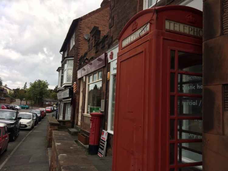 The Heswall Society adopted the red K6 telephone box in Heswall Lower Village