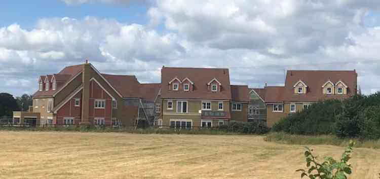 These large homes on Doesgate Lane were supposed to mirror and sit in the footprint of previous agricultural buildings that were on the site.