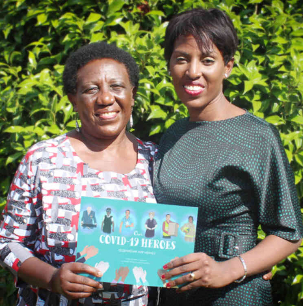 Naomi Lumutenga and Taaya Marjorie Griffith with their book.