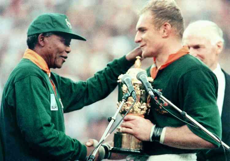 Nelson Mandela celebrates an iconic sporting moment.