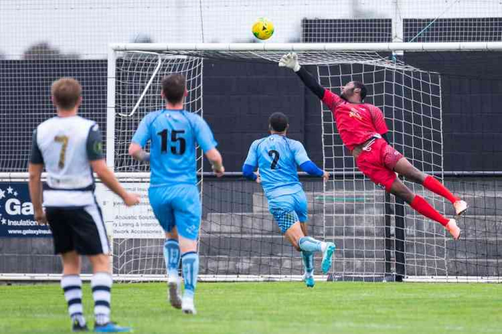 Cray Valley keeper Joseph Osaghae is tested in one of the game against Tilbury's few exciting moments.