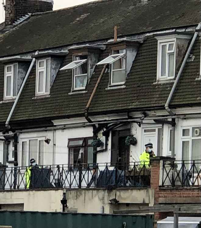 Police officers at the scene this morning.