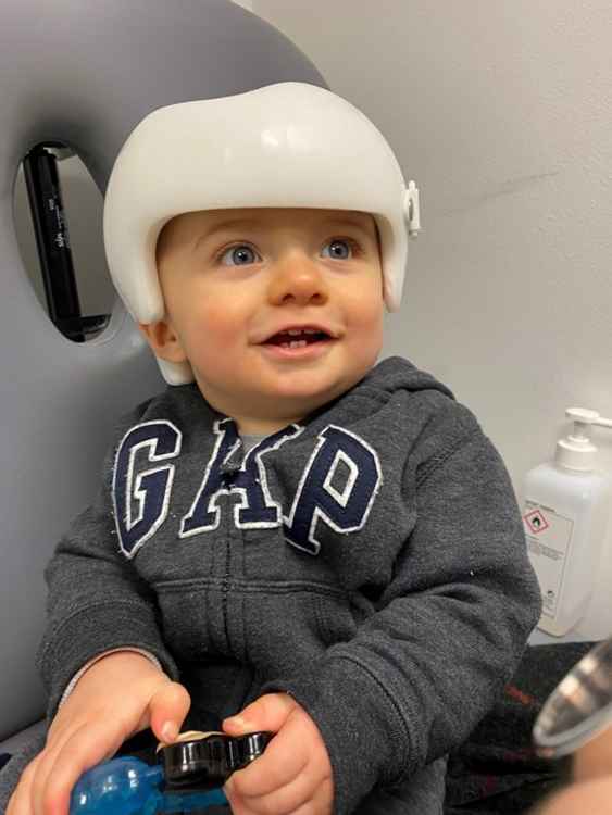 Thomas has a helmet fitting.