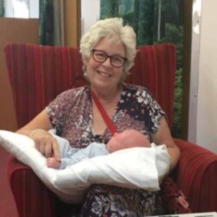 Carol with baby grandson, Jackson, during her stay at the Hospice.