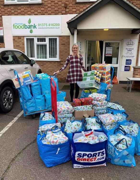 A Random act! Food and other goods delivered to Thurrock Foodbank. Ceri from Thurrock Foodbank is pictured below accepting the donations.