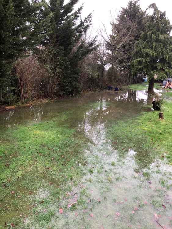 Flooding into Bulphan gardens. Flooding into Bulphan gardens.