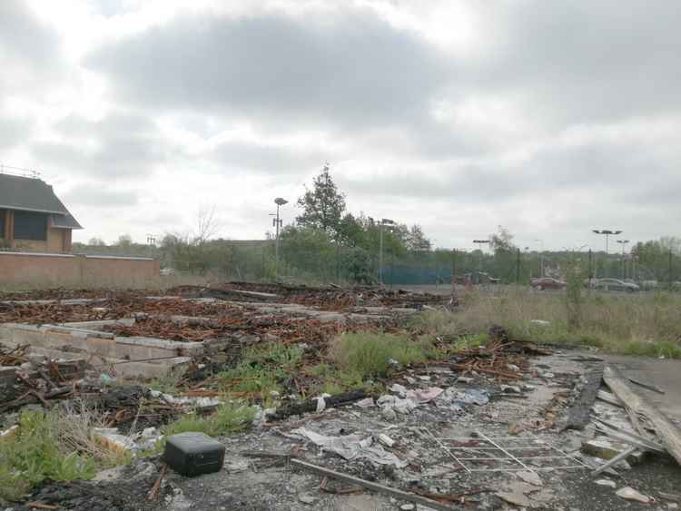 The derelict site.