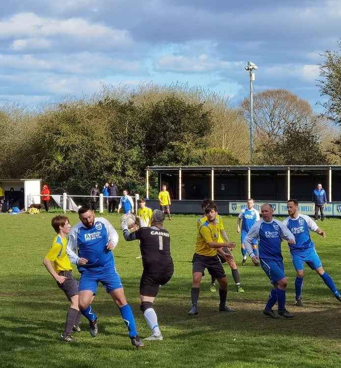 Action from the Junior Cup - which had to be decided by penalties. Picture by Bob Shaw.