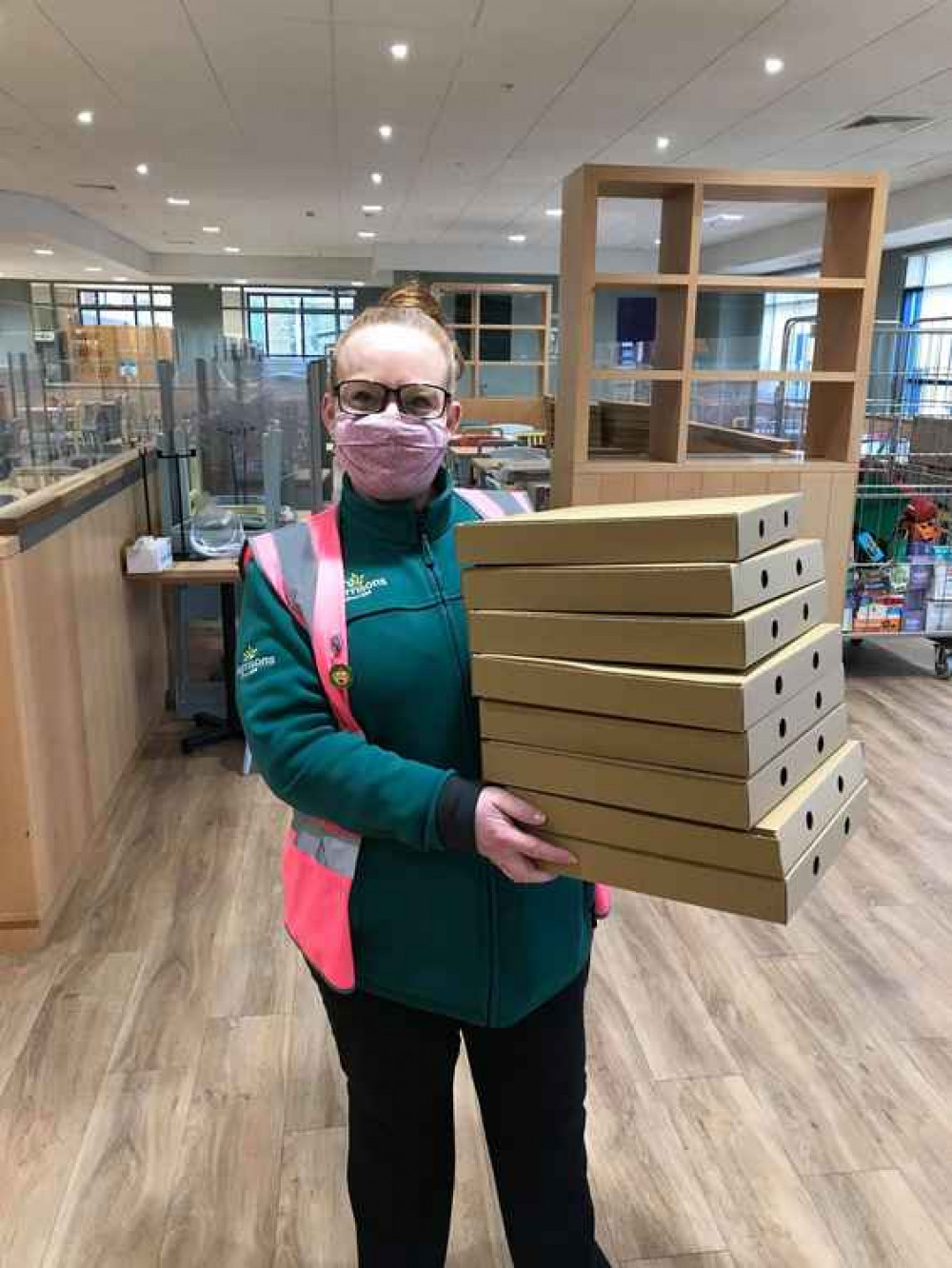Tarnya Bennett with some of the pizza kits going out to families in Grays.