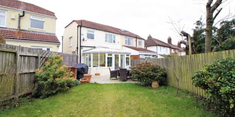 The rear garden and the house